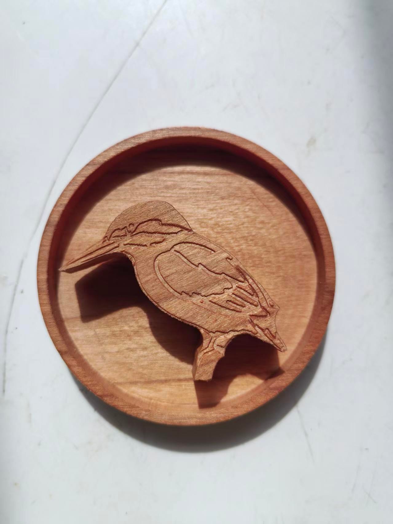 A wooden bird that can spin